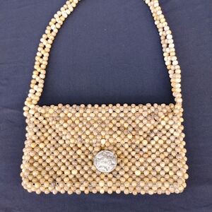 vintage 1960s wooden bead shoulder bag, likely made in Japan,